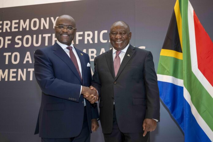Cyril Ramaphosa and George Elombi sign South Africa’s accession to Afreximbank in Johannesburg. Cyril Ramaphosa and George Elombi sign South Africa’s accession to Afreximbank in Johannesburg.