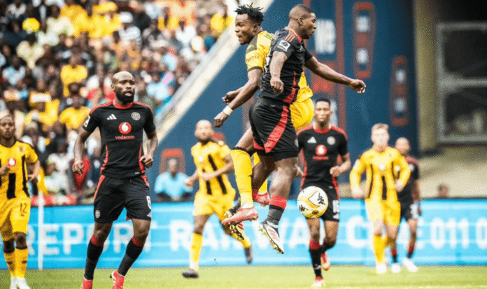 Orlando Pirates and Kaizer Chiefs players contest the ball during the Soweto Derby at FNB Stadium