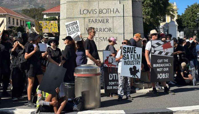 Save SA Film Jobs protesters gather outside Parliament calling for reform of South Africa’s film incentive scheme. Image Credit: Daily Maverick