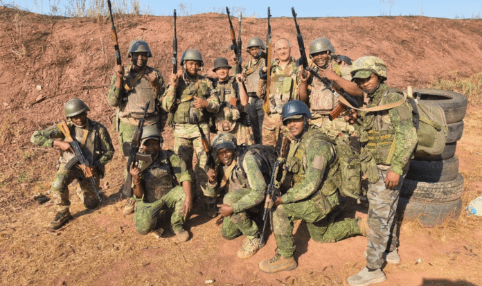 Soldiers operating in a conflict zone amid debris, illustrating risks faced by South Africans recruited for Russia military training