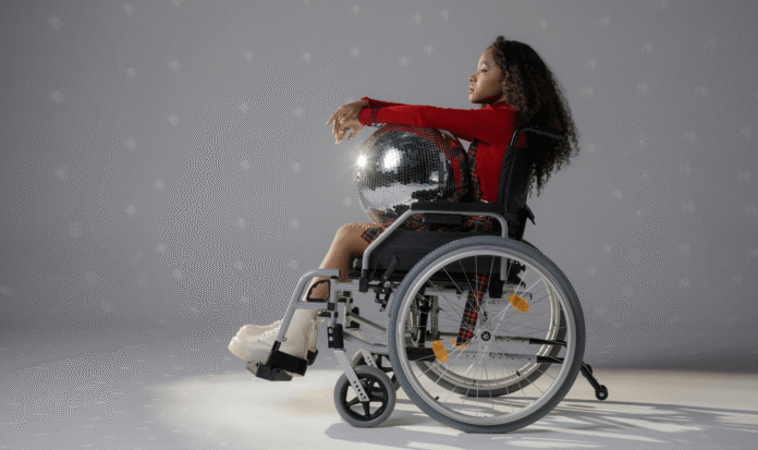 Young woman with disability in a wheelchair, the fight for disability rights for migrants in Africa and the need for inclusion and dignity Young woman with disability in a wheelchair, the fight for disability rights for migrants in Africa and the need for inclusion and dignity