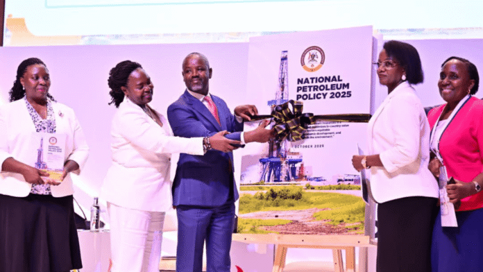 The Dep. speaker and energy officials cut the ribbon to officially open the 11th Oil and Gas Convention in Munyonyo