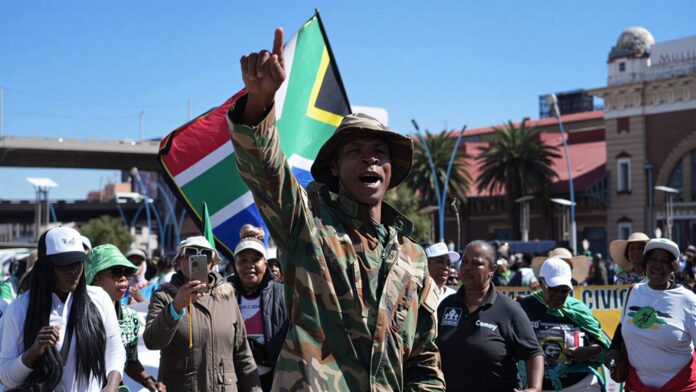 Demonstrators march on the streets of South Africa amid rising anti-migrant tensions and concerns over xenophobia. Image Credit : News24
