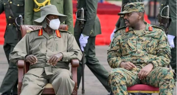 President and Army Commander - in - Chief Gen Yoweri Kaguta Museveni (Left) and his son, Gen Muhoozi Mkainerugaba, the Chief of Defense Force (Right)
