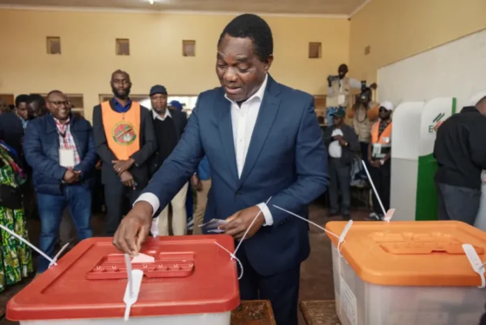 Zambian incumbent President Hakainde Hichilema casts his ballot at the Kabulonga Boys Secondary School polling station in Lusaka on August 13, 2026 [AFP]