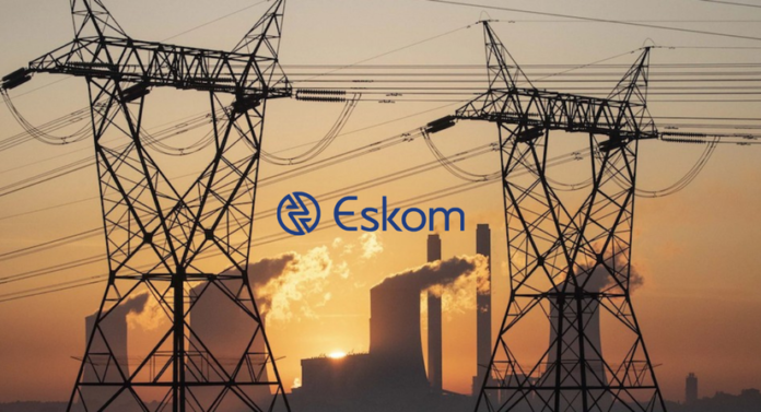 Eskom electricity infrastructure in South Africa as the utility reports a R30.3 billion annual profit despite rising municipal debt and falling power sales.